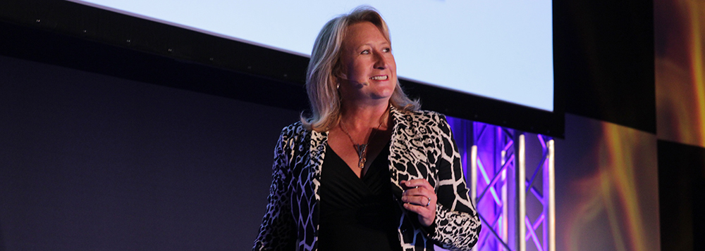 Photo of lesley Everett as speaker in a conference